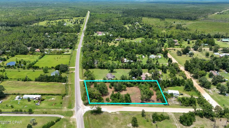 Discover the perfect opportunity to build your dream home or investment property on this spacious vacant lot located at 4027 E Hwy 388 in Youngstown, Florida. Situated on nearly 1.5 acres, this beautiful parcel offers a peaceful, rural setting with plenty of space for privacy, outdoor living, and future development. The property is zoned to allow for site-built, manufactured, or modular homes, giving you the flexibility to create the type of residence that suits your needs and lifestyle. With easy access to major roadways, you're just a short drive from Panama City, the airport, and area beaches, all while enjoying the quiet charm of country living. Whether you're looking to build, bring in a home, or invest for the future, this versatile lot offers endless potential. Don't miss this chance to own a sizable piece of land in a growing area — bring your vision and make it yours today!
