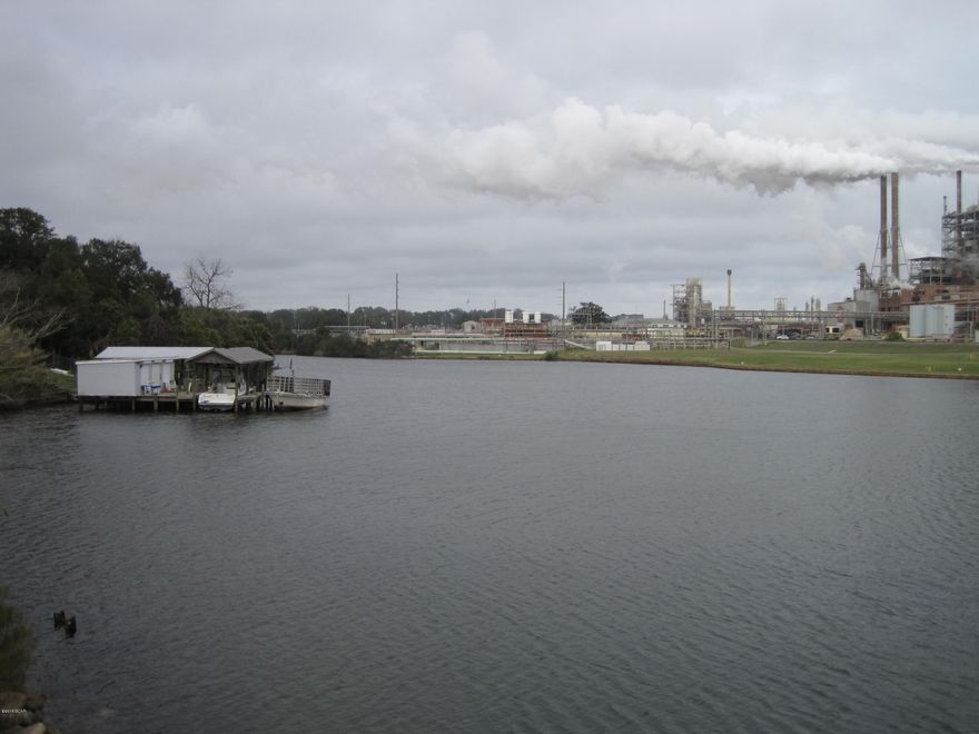 200 plus feet of water frontage on the East prong of Watson Bayou. Property lies between Watson Ave & Nelson Ave. Just off of East Ave.  About 1.15 acres. Their is a 1344 square foot 1993 modular home. This home is being sold ''as is''. It is now vacant. The lot on the waterfront on Nelson Ave has a very nice recently built dock.