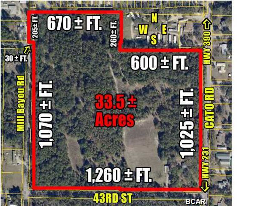 FORGET THE OFFERED PRICE - THE SELLER IS READY TO SELL – MAKE AN OFFER! EXCELLENT DEV. OPPORTUNITY! 33.5 AC on the NW cor. of Cato Rd. and 43rd St. having approximately 1,025 ft. on Cato Rd, 1,260 ft on 43rd St and 1,070 ft. on Mill Bayou Rd. Presently zoned Agriculture. Re-zoning would be required to R1 (8 Units per AC), or possibly R2 (15 Units per AC) for a Residential development. Water & Sewer Avail. The property is located ¼ mile N of Hwy 231 & ½ mile S of Hwy 390. A New North Bay Haven Charter School is located at Hwy 390 & Cato Rd. This is a major employment area with several newer public schools, 2 golf courses and 2 major Recreational Parks. There is an older Residential home on the property which uses a well and septic tank. Haven Recreation Center and Harders Recreation Center) . The property is conveniently located to Bay Industrial Park, Tyndall Air Force Base and many other major employment areas, as well as, retail, hospitals and medical offices. There is presently an older residential home on the property which uses a well and septic tank. The property is available for showing at anytime. A three days notice is required to get access to the house.