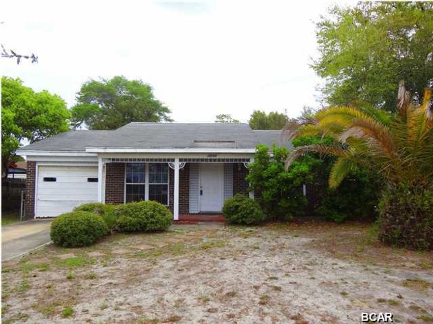 Great first home or investment HomePath property to college and 23rd Street on quiet street in St Andrews. This 3 Bedroom, 2 Bath home with great potential features large Kitchen/Dining Room combo and separate Living Room. The exterior features a deck on a large lot and one car garage. Ready for your personal touches! Age, Square Footage, and room sizes approx., if important please verify.