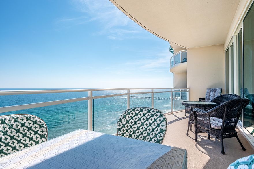 Breathtaking Views await you from this amazing East CORNER PENTHOUSE UNIT with 10 FT CEILINGS and upgraded features throughout.  This is the LARGEST FLOOR PLAN offered at Aqua boasting 3 SEPARATE BALCONIES, an open floor plan, crown molding, large kitchen with new appliances, granite countertops and accent tile featured walls in entry and hallway.   Every bedroom has balcony access and en-suite bathroom. This unit is in immaculate condition and being sold fully furnished with well appointed furnishings and decor.  This plan rarely becomes available in Aqua.....  Come visit us and see for yourself what Luxury Penthouse Living is all about!!