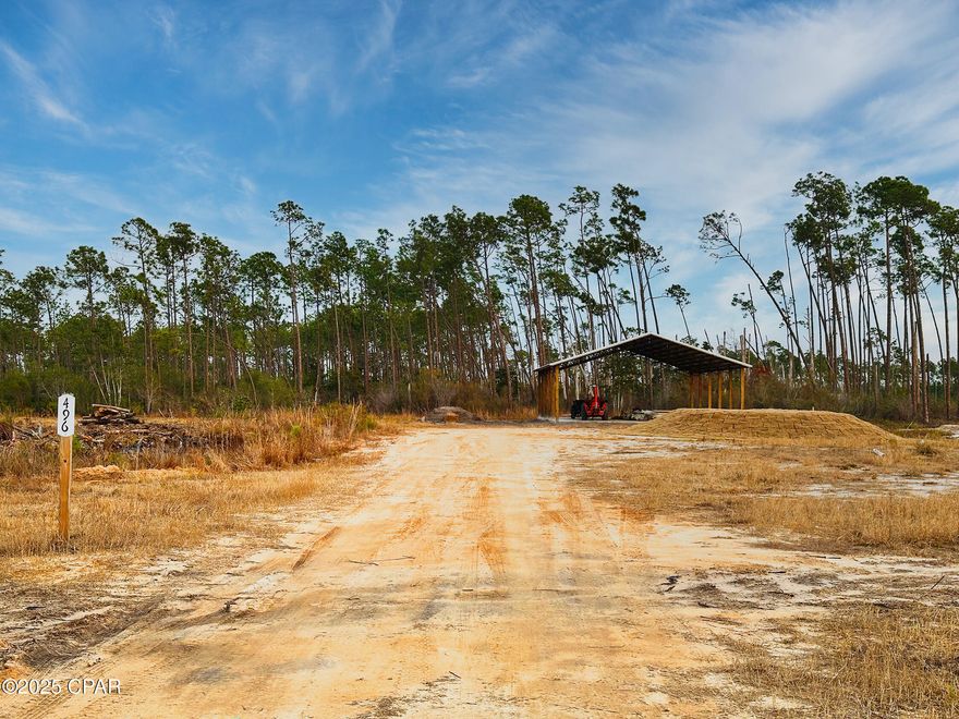 Dreaming of a serene getaway just minutes from the shimmering sands of Mexico Beach? This 75x350 (.603 acre) RV-approved lot is your perfect opportunity! Whether you're looking for a home base for your RV adventures or planning to develop a permanent coastal haven, this property has it all. Featuring a brand new 40x60 Pole Barn with concrete pad, perfect for enjoying your RV lifestyle. This property is complete with culvert, power pole with 100 amp service, public water and brand new septic system all in place. This is a fantastic opportunity to create your own coastal retreat, just 5 minutes from the beautiful beaches of Mexico Beach, and around the corner from a boat ramp on the Intercoastal Waterway. Whether you envision a peaceful RV home base or a permanent residence, this lot offers endless possibilities. *This listing is for the .603 acre (75x350) south section of Parcel ID 03500-020R . Seller to have New Survey and division of lot done by closing* Call today to make your offer!