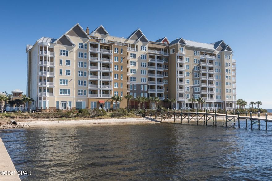 Overlooking beautiful St. Andrews Bay this highly sought after Floor Plan D gives expansive views of the bay from the wrap around balcony. With over 2321 sq ft in living space and 348 sq ft of balcony you could hardly call this downsizing, it is life-styling. Stress-free living frees up your time to do the things you enjoy best, whether that be boating, kayaking, walking, swimming, biking, fishing, entertaining, shopping, the list just doesn't seem to end. Harbour Village gives upscale living within a small town feel of St. Andrews. Strolling to local parks, enjoy coffee at local coffee house cafes or to dinner at the local seafood restaurants where you meet friends for a fabulous meal. This elegant unit has stainless steel applianc The seller has put in new flooring, china wall cabinet in dining area and upgraded pantry. Take a look at the built in liquor cabinet in kitchen and the stove is brand new. Never been used. These units also are the only few that have a gas grill on the balcony.