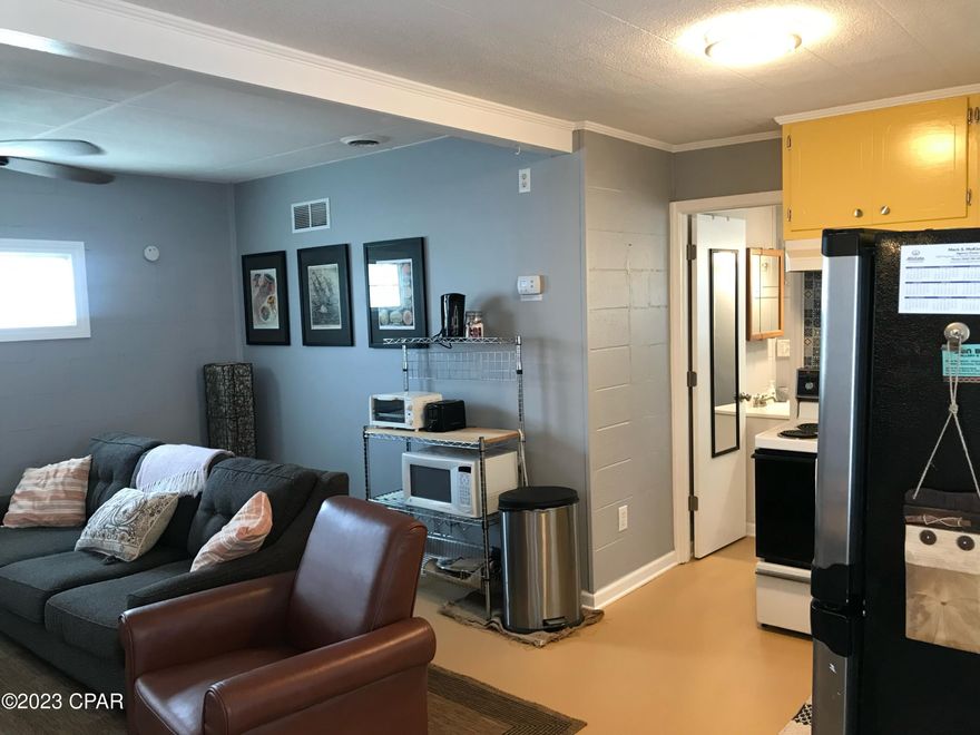 Super Cute 2 bedroom 1 bath apartment. Utilities included- That covers power, water, trash, cable and wifi. Only two blocks from the beach! Large fenced in back yard. Pet friendly. This unit comes unfurnished. There is also a washer and dryer provided in the garage for use by both units.