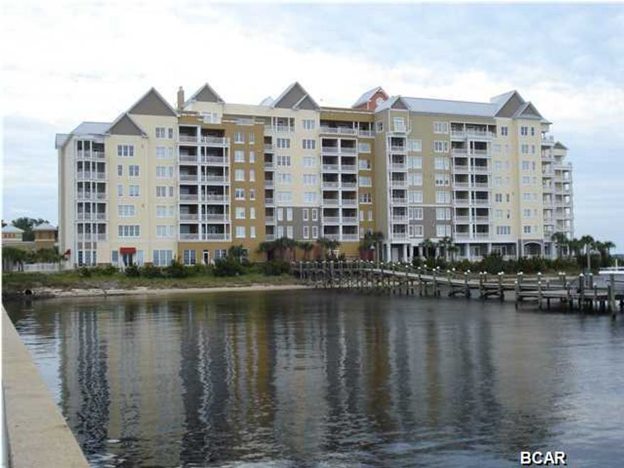 You will feel like your on vacation everyday with the expansive bay views and striking sunsets right out your window. Sitting on Buena Vista point this luxury condominium has 10 ft ceilings, triple crown moulding, hardwood and travertine floors. Granite countertops and open floor plan with split two bedrooms and two baths. The balcony becomes 153 sq ft extended living space with the cool breezes coming across the water. This unit comes with a boat slip with lift and marina storage unit as well as an additional storage unit on the first floor. What makes Harbour Village stand out among the other communities is the large parking garage with private park built on top. The park has extensive sidewalks for exercise or a romantic stroll, large gazebo with furnishings and a gas fireplace