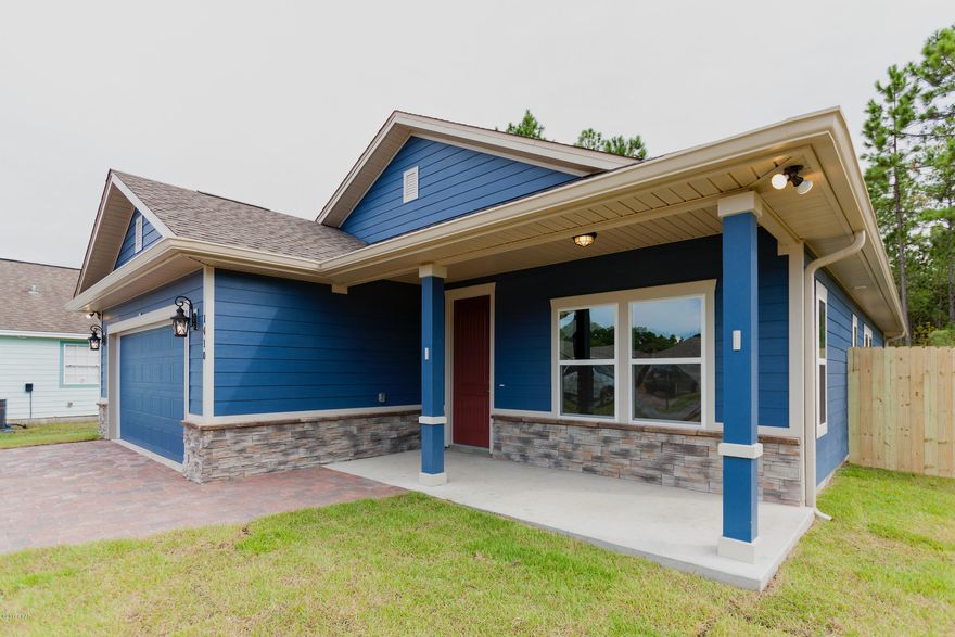 New Construction at Hidden Ridge!  Hidden Ridge is a New 21 Home, Secluded Subdivision in Lynn Haven off Hwy 390. Hidden Ridge has Underground Utilities, Paver Driveways, Sidewalks and Decorative Street Lights. This beautiful New Construction Home features 10 Foot Ceilings, hard wood look porcelain tile flooring throughout Main Living Area and Bathrooms. The Kitchen has All Wood Cabinets, Granite Counter Tops with under Mount Sink, Breakfast Island and Whirlpool Stainless Appliances. Some of the Standard Features include: Tremendous Master Walk-In ''Step Down'' Showers with 2 Shower Heads, 8ft Interior Doors, Paver Driveways, Upgraded Carpet and Pad, 14 SEER Heat Pumps, Anderson LOW E Double Paned Windows...  Call today to view. Put Hidden Ridge and this wonderful New Home at the Top of your List of Places to See.