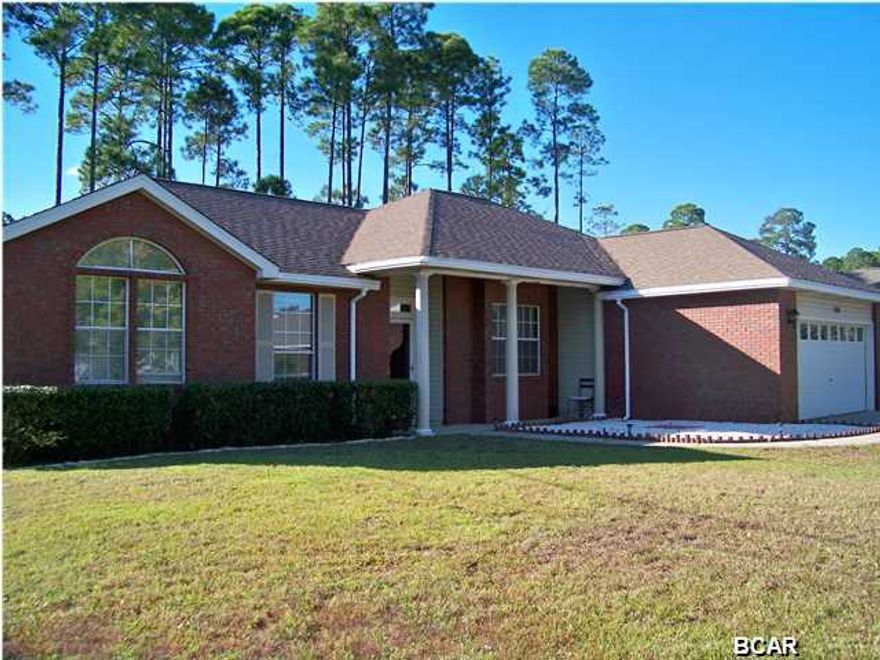 This gorgeous four Bedroom Three Bath all Brick home located in Lynn Havens North Harbor Landing Subdivision, has plenty of room inside and out and with lots of extras to boot. As you enter the home, the foyer opens up into the massive Great Room with tile floors and a comfy fireplace for those chilly nights. The kitchen is generous with considerable cabinet space for storage and cooking. In the back there is a marvelous Horizon sunroom with tinted windows and a great view of the backyard that would be perfect for enjoying a good book or just relaxing. The master bedroom is quite large with a master bath with a separate bathtub and shower. There are four bedrooms in the home, two with private baths and one would make an excellent office. The home features a split-bedroom floor plan.