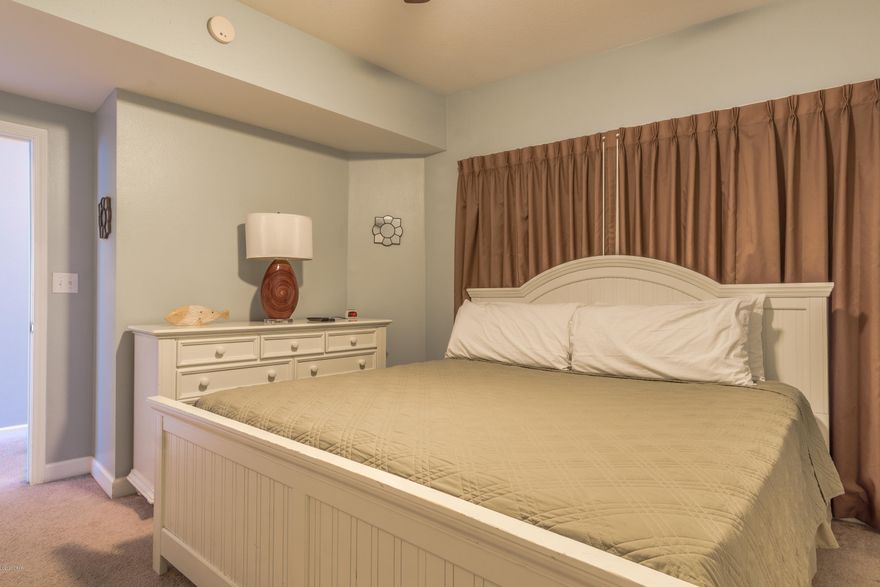 Now is your chance to own a piece of paradise in the beautiful Shores of Panama. With a 14,000+ sq ft pool, indoor pool, tiki bars, and being on the Gulf of Mexico doesn't leave anything left to be desired! This one bedroom unit comfortably sleeps 6 and is rental ready! Comes with dedicated parking space.  Pictures in listing are of like unit.