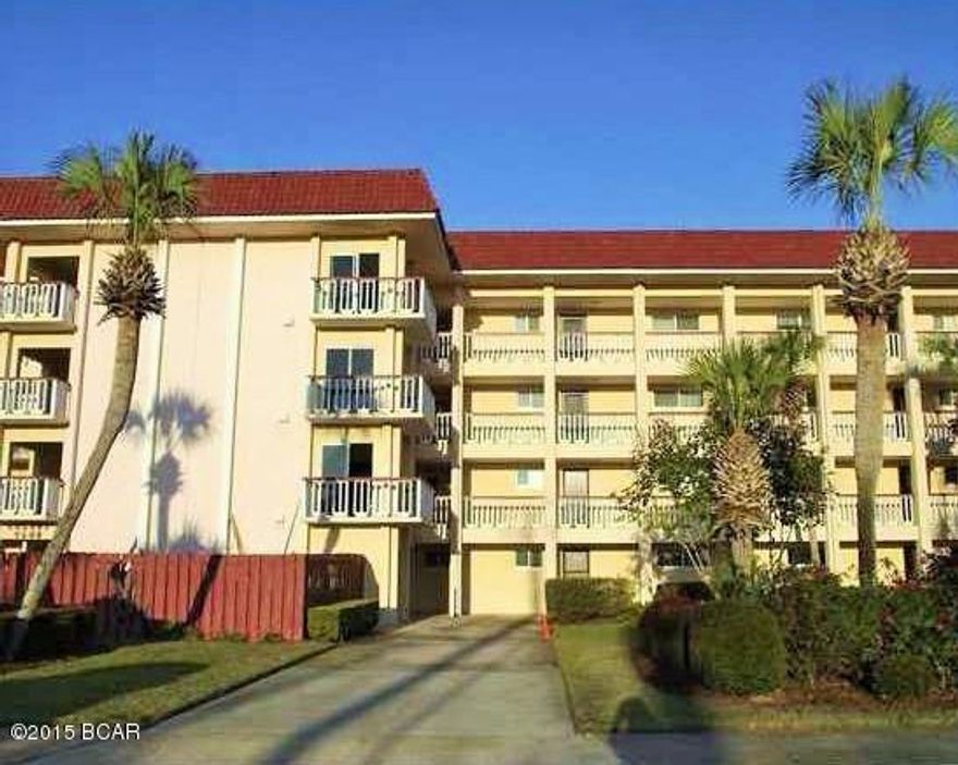 Very well maintained and updated two bedroom/two bath condo located in the COLONY CLUB. Great location on Back Beach Rd close to Pier Park, the beach and the airport. Beautiful screened in balcony overlooking the golf course and pool. Kitchen has plenty of cabinets, combo living/dining, spacious bathrooms and a large master bedroom. Carpet in living areas and tile in kitchen, foyer, hallways and bathrooms. Master bedroom has two large closets and a slider opening to the balcony which has a storage closet and ceiling fan. Beautifully kept grounds, large community pool and club house. Sq footage is approximate - buyer please verify if important.