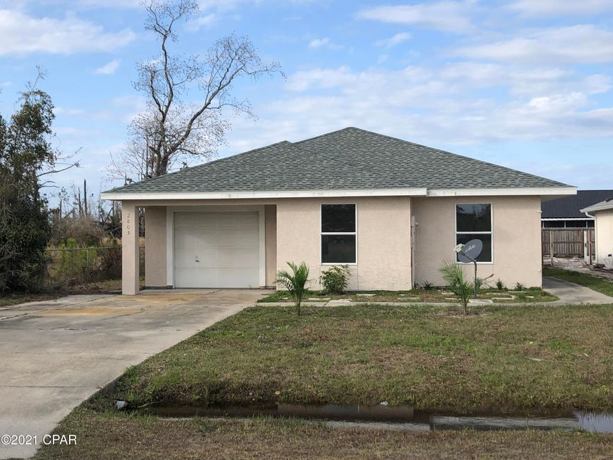 Updated listing !!!! This 3 bedroom, 2 bath home split plan has been totally renovated from the floors to the new roof. The common areas are tile with wall to wall carpeting in the bedrooms. It has an open plan from the kitchen thru the family room. The dining area has a sliding glass door that accesses a rear covered porch. From the family room you pass thru a laundry room to the single car garage.The home is total electric, but plumbed for gas and the water heater and furnace are gas. A new appliance package including range, refrigerator and dishwasher is on order and included with the home. It is eligible for Conventional, FHA, VA, and USDA  financing. Call for a showing.