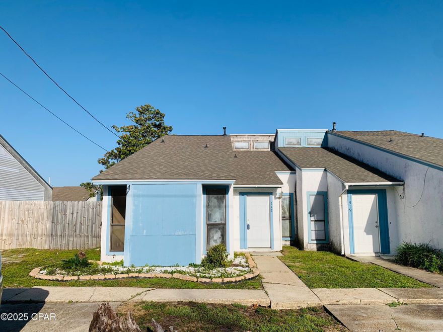 Price Reduced!!  Spacious townhome with tons of potential.  Come view this two bedroom one bath townhome in Parker, close to Tyndall Airforce Base.  This neighborhood provides an HOA with community pool and courtyard area which is great for families or just sitting outside relaxing in the green space.  The complex is right across the street from Parker Elementary.  The townhome features two bedrooms downstairs with bathroom shared between master bedroom and hall.  The upstairs loft has closets and could easily be converted into a third bedroom.  The spacious great room gives the home an open feel with easy access to kitchen and covered back patio.  A/C replaced on 9/21/23.  This unit is part of a duplex with both sides for sale.  Unit 517 is in need of cosmetic renovations while unit 519 has already been remodeled.  You can purchase one or both sides together.