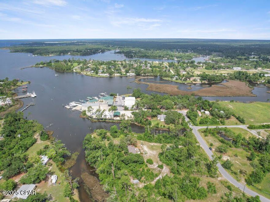 Prime opportunity on Fanning Bayou! This beautiful property offers endless potential, perfect for investors, ideal for developers( Could be Bay Counties next waterfront community), and fantastic location for a business venture. With excellent access to Highway 77, this property combines waterfront appeal with high traffic visibility. Whether you're planning a thriving business or a thoughtfully developed neighborhood, the location can't be beat! This property is zoned C-1 Neighborhood commercial with deep water access! All measurements are approximate and should be verified by buyer.