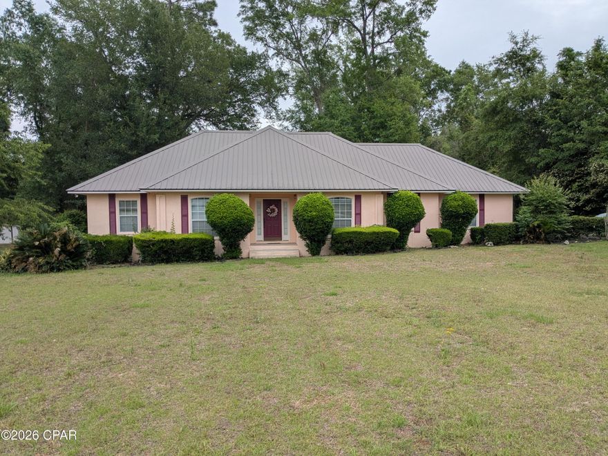 Very nice home located in Oaks Subdivision
North of Marianna off the Caverns Road.
Home has 3 spacious Bdrm's and 2 Baths.
Kitchen has new stainless steel appliances and home has new flooring throughout most of the house. The back deck is very large with lots of room for grilling out or relaxing under the trees overlooking the back yard. 
Home has annual renewable termite bond. Home has springler system in the very large front yard. Don't miss out on this one,