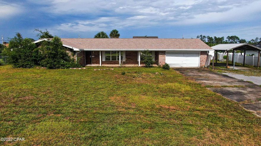 CURRENTLY UNDER CONTRACT, SELLER WILL CONSIDER BACKUP OFFERS.

Hurricane Michael damaged home with new roof  sitting on just over 1/2 an acre. This home is 5 bedroom 2.5 bath; mostly gutted. There is so much potential here! Schedule your private showing today!!