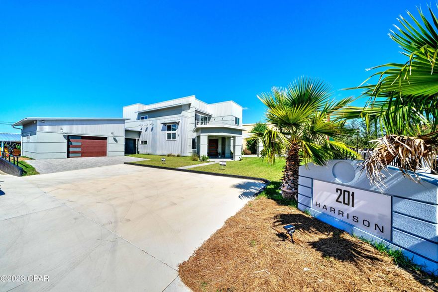 UNIQUE!! Here is your QUINTESSENTIAL, ONE-OF-A KIND HOME!!! Prepare to be captivated when you enter through the oversized mahagony front door. There you will meet a blend of industrial, contemporary construction.....yet boldly charming. The kitchen will inspire the chef in you - a Wolf 5 burner gas cooktop located in the enormous island, Dacor double ovens with separate warming drawer, Subzero French door refrigerator, Gaggenau dishwasher, wine fridge and entertainment sink. Garage has been converted to an AMAZING CASITA!! Or, move furniture, park your cars there. The walkability to St. Andrews Bay and the multitude of amazing local restaurants, breweries, coffee shops and unique shopping experiences make this property truly AWESOME!!!  Also includes a whole house gas generator, separate HVAC systems for both floors, a SONOS system (wired for sound) throughout as well as a gas Riannai water heater. Being sold FULLY FURNISHED!! Use as an Airbnb or Family Home. Call your Favorite Realtor to see this one today - experience the epitome of contemporary living in a DOWNTOWN setting. Buyer to verify measurements.