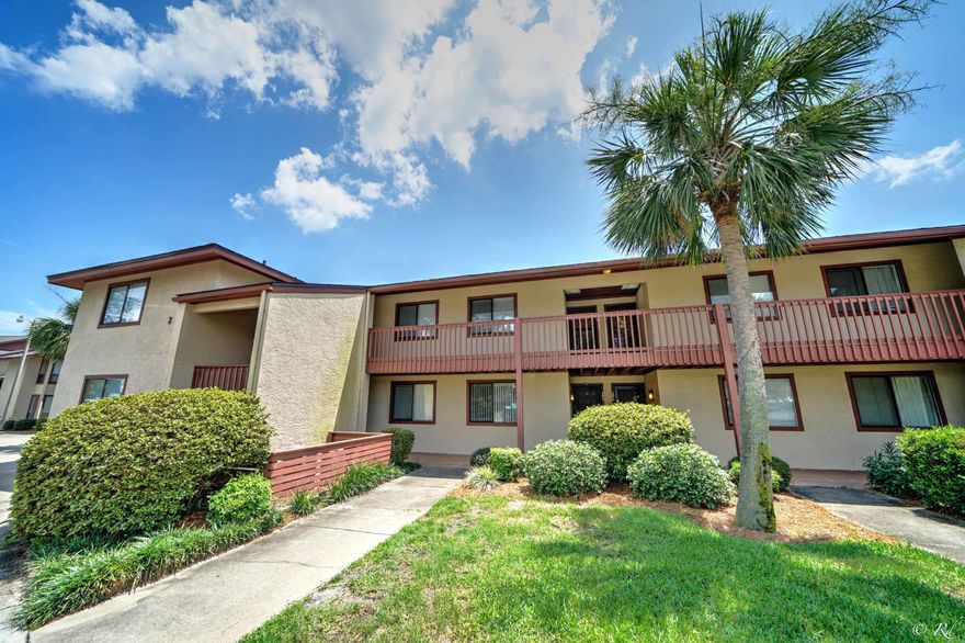 This is a fabulous first floor waterfront condo with a screened deck overlooking beautiful Grand Lagoon!! This unit is right across from the pool area, and you'll never have to use the stairs! Includes a dedicated parking space right in front of the unit. Kitchen has been upgraded and unit is in move in condition, just waiting for you! Point Lagoon is quiet association with a community pool and is just minutes from the beach. HOA fees include cable, water, trash, and grounds maintenance. This well priced ground floor / first floor unit won't last long, make your private appointment to see it.