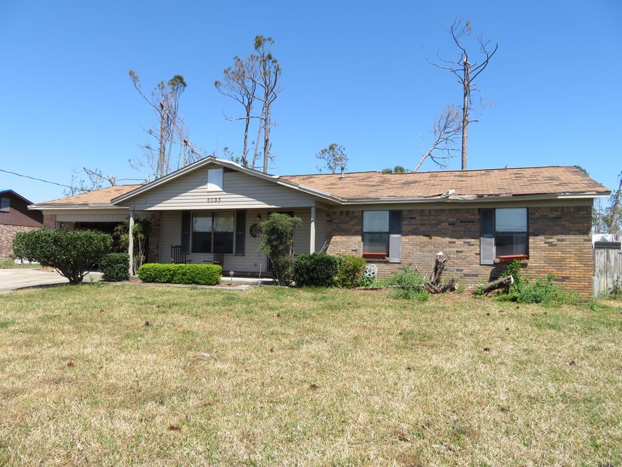 Investor special!  This hurricane damaged brick home is being sold ''AS IS''.  It needs a roof, ceiling repair, pool repair and garage repair.  The floorplan offers a living room plus a great room with a fireplace.  The great room has a vaulted ceiling and is open to the kitchen and has sliding doors going out to the pool and hot tub.  The seller installed a whole house gas generac so they didn't lose power during the hurricane.  This conveys as does the furniture, freezer, 2 refrigerators, a riding lawn mower and more!  This is a great investment opportunity that won't last long.