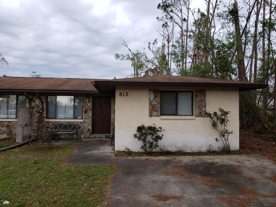 This is a very nice three bedroom and two bedroom duplex at the end of the cul de sac. (Split bedroom plan) 1254 sq ft and a very comfortable layout. New carpet being installed last week of December. Recent a/c system, roof 2007. Very little damage to structure from hurricane. No flooding. Very economical living just between Lynn Haven and Panama City. Great Schools nearby, Mowat, Mosley, North Bay Haven and Bay Haven. Very centrally located,  Mins from 23rd street and Hwy 77, not in flood zone, flood insurance not required but seller had it for $450.00 per year.