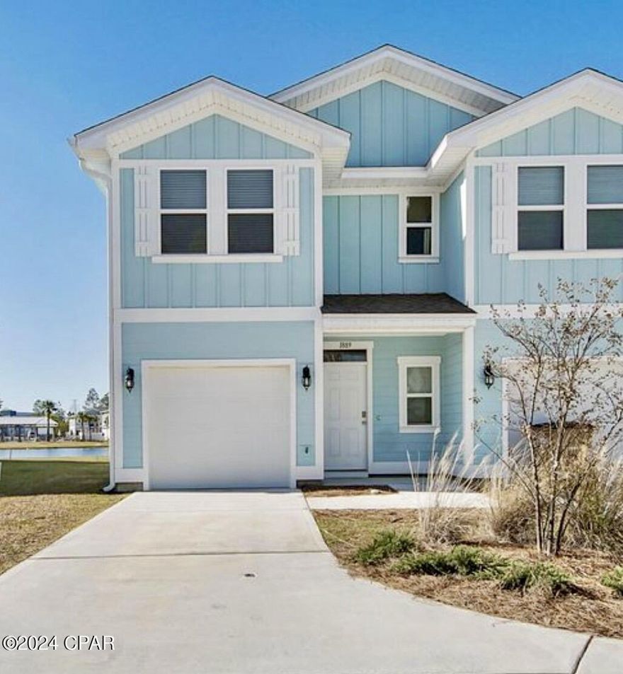 CURRENTLY UNDER CONTRACT, SELLER WILL CONSIDER BACKUP OFFERS - SHORT TERM RENTALS ALLOWED!!  First 12 months of HOA dues paid, (Seller concession to buyer at closing), with full price offer!  Welcome to this beautiful townhome nestled in the highly desired area of PCB! Boasting an unbeatable location, this townhome is located less than 2 miles from Publix Sports Park, and just minutes away from the beach, navy base, or a quick drive into town. This property is perfect for investors or those seeking an ideal primary residence. Built in 2019, this 3-bed, 2.5-bath end unit features a one-car garage and a picturesque backdrop of a tranquil pond with a fountain, providing a serene retreat on the back deck. The interior showcases a modern and vibrant color scheme, an open kitchen and living space with stainless steel electric appliances, and a complete smart home package with voice activation features. Upstairs, the main suite offers a full bathroom with his and her sinks and a stand-up shower, while two additional bedrooms are served by a second full bathroom. Enjoy the year-round pool amenities of this community, with the Homeowners Association handling trash removal and grounds maintenance. This smart home is move-in ready, complete with brand-new stove, upgraded carpet and paint installed in February 2024. With a long-term excellent rental history, including a recent rental value of $2,350 per month, seize this opportunity for a seamless blend of comfort and investment potential!  If measurements deemed important, please verify.