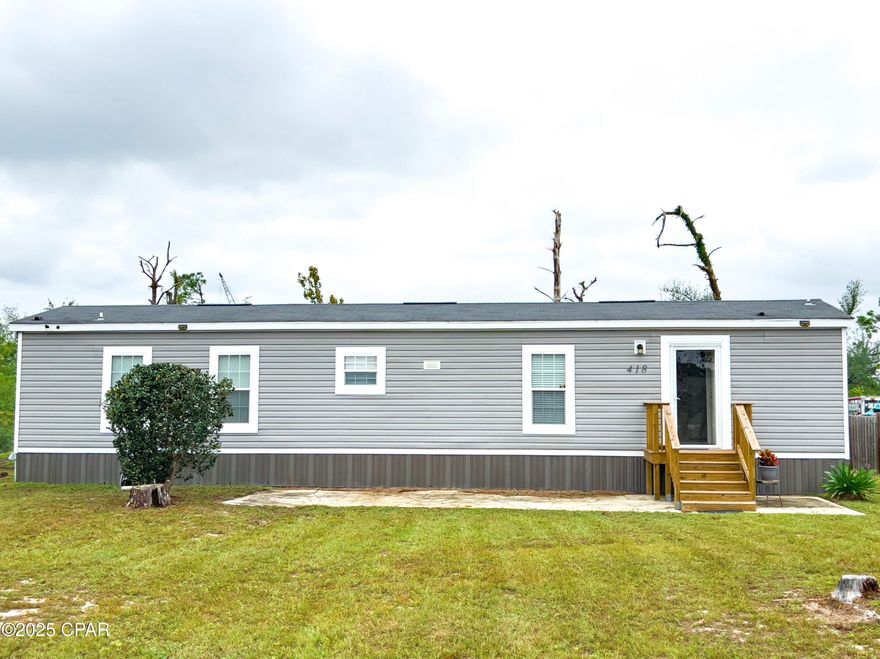 ''CURRENTLY UNDER CONTRACT, SELLER WILL CONSIDER BACKUP OFFERS''  This charming Live Oak Manufactured Home offers 840 sq. ft. of comfortable living space nestled on a spacious area of.33-acres. Situated just a quick walk away from the scenic John B Gore Park, you'll have easy access to its boat ramp and ball field for outdoor enjoyment.

From the kitchen window, you'll have a picturesque view with a slight view of the Callaway Bayou in the distance. Located just minutes away from Tyndall Air Force Base, this Home is perfect for a starter home, secondary home or a rental property. Conveniently located nearby, you'll find a variety of stores and restaurants in Callaway, making errands and dining out a breeze. For beach enthusiasts, this location is only 25 minutes from the pristine shores of Panama City Beach and 30 minutes away from beautiful Mexico Beach, allowing you to soak up the sun and enjoy the coastal lifestyle. Additionally, the shopping areas at Pier Park are just a 35 minute drive away, offering a wide range of retail options and entertainment. Don't miss the opportunity to make this peaceful space your own, with its ideal location and abundance of nearby amenities. The Sellers are motivated and open to hearing all offers!