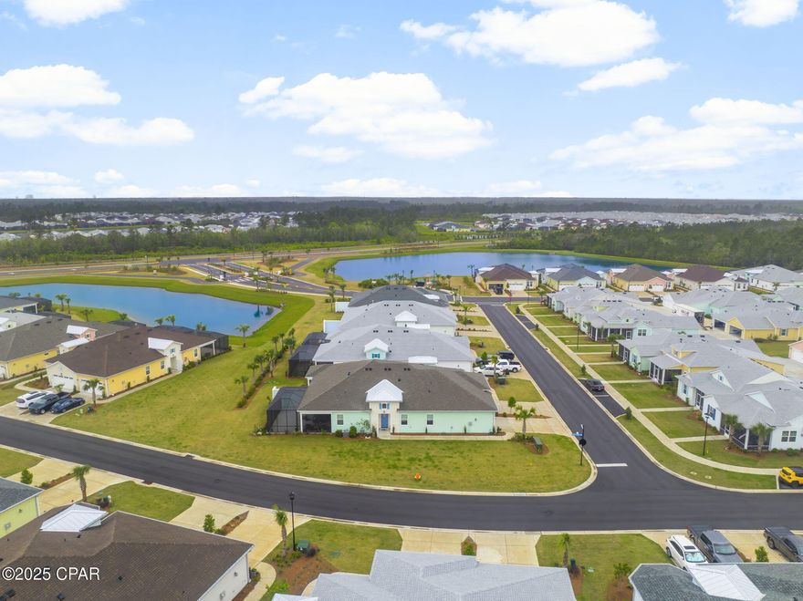 CURRENTLY UNDER CONTRACT, SELLER WILL CONSIDER BACKUP OFFERS.
INCREDIBLE VALUE for a VILLA!!! Looking for rare oversized lot, look no further, this Antiqua Villa floorplan sits on a huge CORNER lot with a peek of a pond view. This home is Nestled in sought after Latitude Margaritaville Watersound a beautiful 55+ Active Adult community perched along the Intracoastal Waterway, offering residents an unparalleled lifestyle. This like new, Villa offers a open concept floorplan featuring a dramatic kitchen with rich brown cabinets with soft-close/dovetail, stainless steel electric range, granite countertops and a large island. Huge Great Room with large slider glass doors over looking the extended lanai, recessed lighting and a trey ceiling. Den/Office or could be used as a 3rd bedroom. The master/primary ensuite offers a trey ceiling, bath with brown cabinetry, rubbed bronze facets, tile floors, oil rubbed/glass shower enclosure. Guest room and secondary bath area of the home has as a pocket door offering the ''guest suite'' privacy. Guest bath has rich brown cabinets and tile floors, shower/tub combo. Laundry room with tile floor. Window treatments with shades throughout and upgraded tile floors throughout the entire home for easy care, custom ceiling fans and light fixtures in all rooms. Hardwired scones in dining room. Large, extended lanai fully screened, offers the best sunrise and wildlife views year round. A spacious 2-car garage with epoxy type floor coating. 

Latitude Margaritaville Watersound offers a 2 story full service restaurant, resort style outdoor pool both overlooking the Intracoastal Waterway, A state of the art fitness center with an indoor lap pool and spa, fitness classes, water aerobics and more. Pickleball and tennis courts, a bandshell with a dance floor and music every Friday and Saturday night / activities year round. Kayak launch, game lawn with bocce ball, cornhole and ping pong. A theater, pet grooming, workshop and ceramics shop is currently being built. A future public marina and commercial area are planned with grocery store, shopping and dining. Quick golf-cart ride to the amenities while taking in the Intracoastal Waterway views from the paths. 

The lanai will accommodate a future pool or hot-tub. Home has a 2 year Master Care Builders warranty from the original close date and a builders 2/10 year structural warranty from the original build/close date. All lawn care is maintained by the HOA, exterior paint and roof replacement on a maintenance schedule are done by the HOA. 

Easy, carefree living! Must see this beautiful coastal home just 8 miles from the BEACH! The unparalleled lifestyle of this beautiful Florida community awaits you!