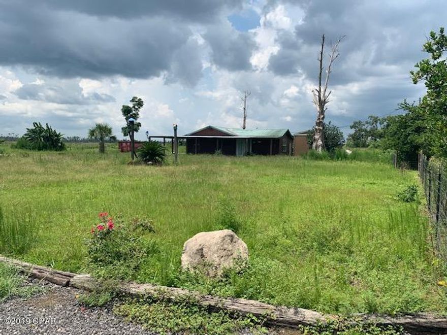 3 bedroom/ 1 bath rustic farmhouse on one acre just north of Panama City. Wrap around front porch and fenced yard with cattle gate and  nice tree lined drive. Large outdoor storage building with a/c unit. Zone X



All measurements approximate. Please verify if important.