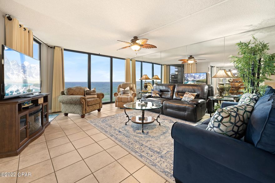 Highly sought after 2 Bedroom / 2 Bath Deluxe floor plan located on the very desirable 5th floor level of Tower III in Edgewater Beach and Golf Resort. Floor to ceiling tinted glass windows encompasses the kitchen, dining and large living room areas with unobstructed views of the Gulf of Mexico. Beautiful updates have been made, including tile floors throughout the condo as well as on the private beach front balcony. All countertops and cabinets in both the kitchen and bathrooms have all been replaced and decorative tile accents have been added. This condo is currently a vacation rental and is classified by the management company as a VIP unit. The unit is being sold furnished and rental ready! Edgewater offers numerous amenities including a heated swimming pool directly behind Tower III, including a heated swimming pool directly behind Tower III, a lagoon pool and nine other pools, whirlpools throughout the resort. In addition, an onsite restaurant/bar with a full menu is open year-round, convenience market, Club golf, tennis, shuffleboard, exercise facility, gated entrance and 24 hour security. Owner's pets are welcome! Edgewater is located in the heart of Panama City Beach, with restaurants, shopping and entertainment all within walking distance.