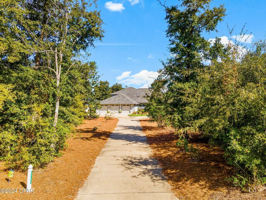 Welcome to your dream home nestled in the beautiful gated community of Cedar Creek at Deerpoint Lake. This stunning custom-built residence features 4 spacious bedrooms and 3.5 baths, perfectly designed for comfortable living and entertaining.  Every bedroom has a view!
Step inside onto beautiful Bamboo floors that flow throughout the main living areas. The heart of the home is the expansive living space, seamlessly connecting the dining and kitchen areas, ideal for gatherings with family and friends.
The master suite, conveniently located on the first floor, offers a private retreat with an ensuite bath designed for relaxation, featuring modern fixtures and finishes. Two of the downstairs bedrooms share a huge Jack and Jill bath, providing both convenience and privacy.
The upstairs features an additional bedroom or home office with its own private bath and loft-style seating area.  
Storage will never be an issue in this home, with ample closets and additional spaces thoughtfully integrated throughout.
Step outside to enjoy the views of Deerpoint lake from the screened porches at the front and rear of the home.
Completing this exceptional property is a spacious 3-car garage, providing plenty of room for vehicles, outdoor gear, and additional storage.
This custom home is a true sanctuary, blending luxury, functionality, and the beauty of lakeside living in one of the most sought-after communities. Come experience the lifestyle you've always wanted at Cedar Creek!