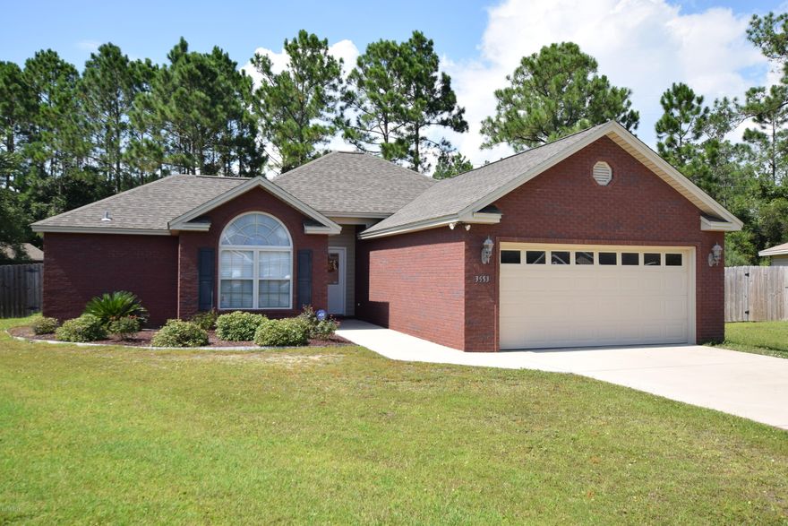 Immaculate brick home that needs a new family to call it theirs. You will feel right at home from the time you pull into the driveway. Features split bedroom floor plan, 10 Ft ceilings, crown molding, recess lighting and electric fireplace. Completely tiled through out except bedrooms. Eat In kitchen with stainless steel appliances, pantry and tray ceiling. Spacious master bedroom and bathroom. Double vanities, whirlpool tub, separate shower and walk in closet. Large backyard with covered porch and privacy fence. Double car garage with separate area for storage and pull down attic with storage. Nicely landscaped and sprinkler system with separate water meter. You do not want to miss your chance to see this home.