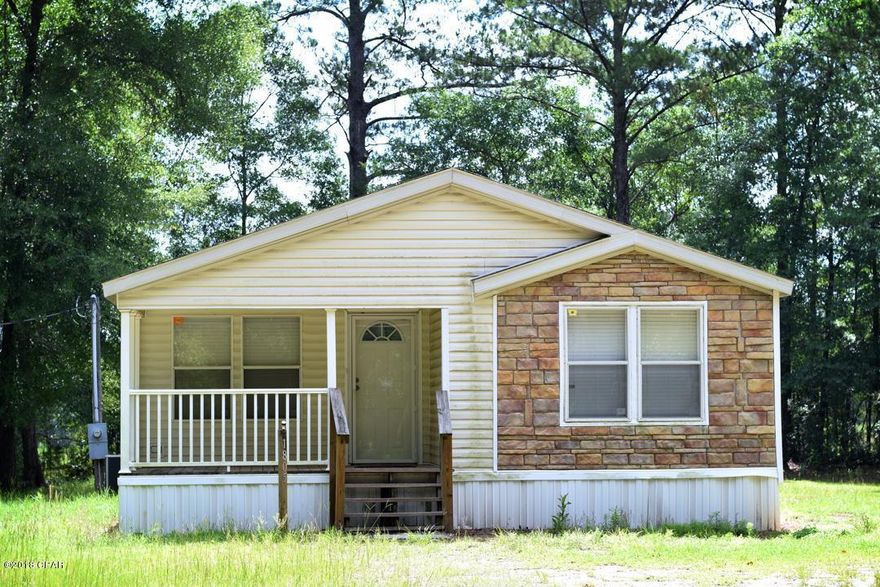 Looking for something that will get you more bang for your dollars?  Look no further.  This is a very nice 3/2 house on almost an acre.  Needs a little TLC but well worth it.