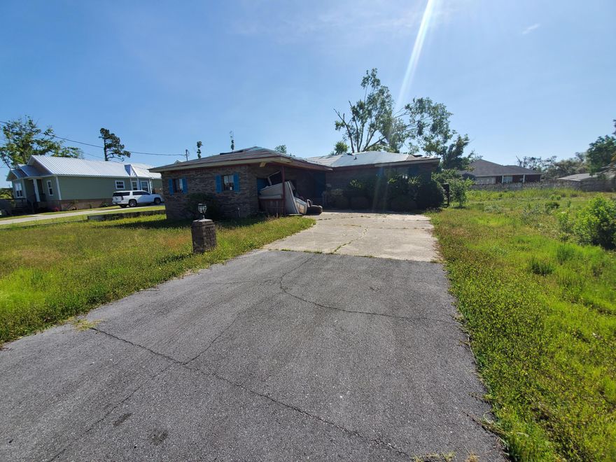 All Brick 3/2 with 2 car garage in the heart of Lynn Haven. Just a block from North Bay and short walk to Kinsaul Park. Home suffered severe damage during hurricane Michael but is solid and ready to be beautiful again. Spacious Floorplan. Plenty of potential with a tremendous upside once renovated. Some demo work is already complete.