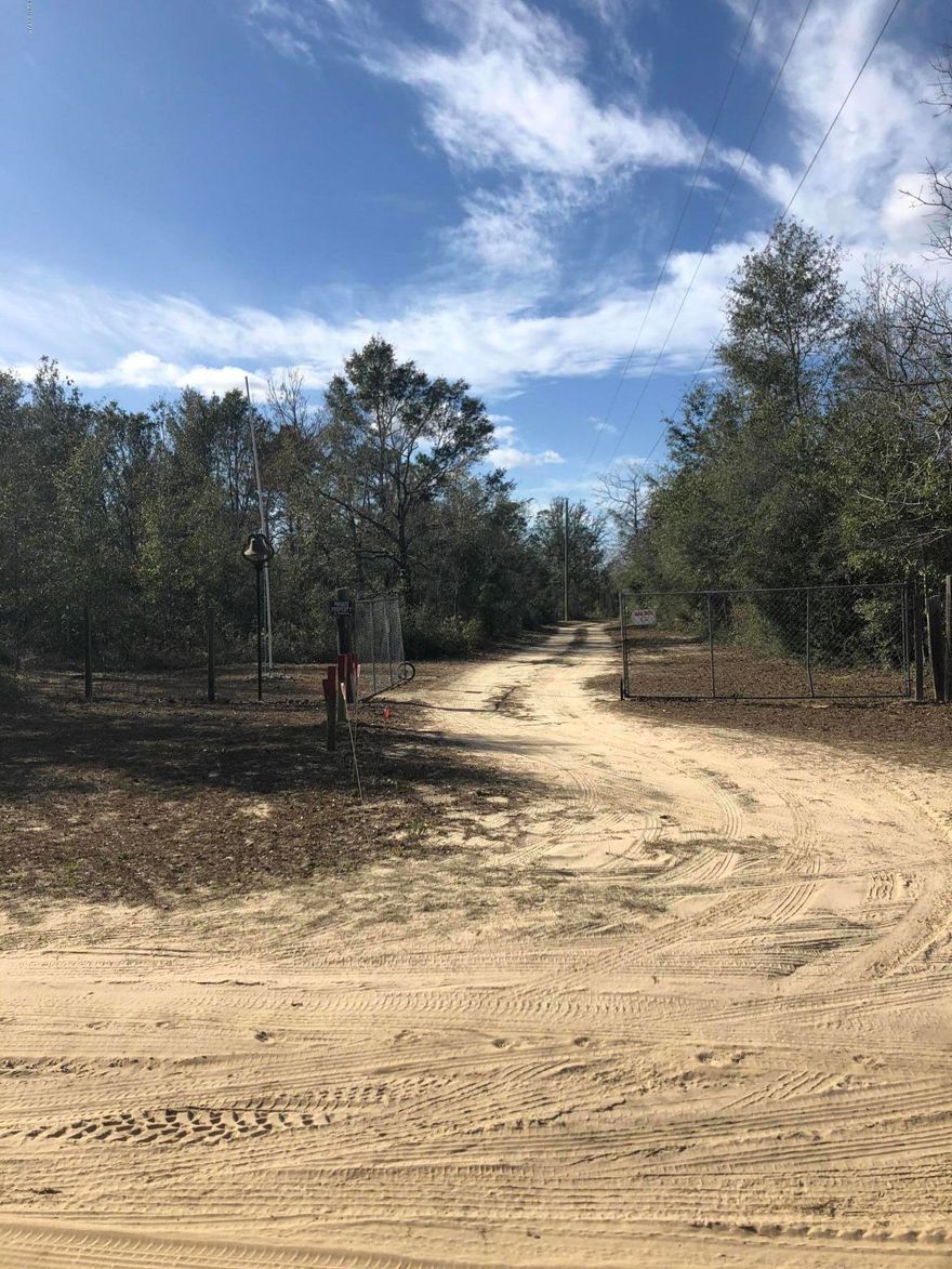 Are you looking to have a nice, quiet, country home to enjoy all that nature has to offer? Look no farther than these 15 acres in Fountain. Fix up the current home or build/place your next home. You will have the peace and quiet of country living yet only 30 minutes from Panama City! Bring the horses or have fun with your 4 wheelers. Deer and wild life abound on this property! Well and septic systems already in place along with two security light polls, partially fenced with locked gate at entrance to property. Circular drive around the house. Single wide 2/2 mobile home with considerable hurricane damage, but currently livable. Plenty of trees still standing with hunting trails already in place. Seller says make an offer! Call today to schedule your showing.