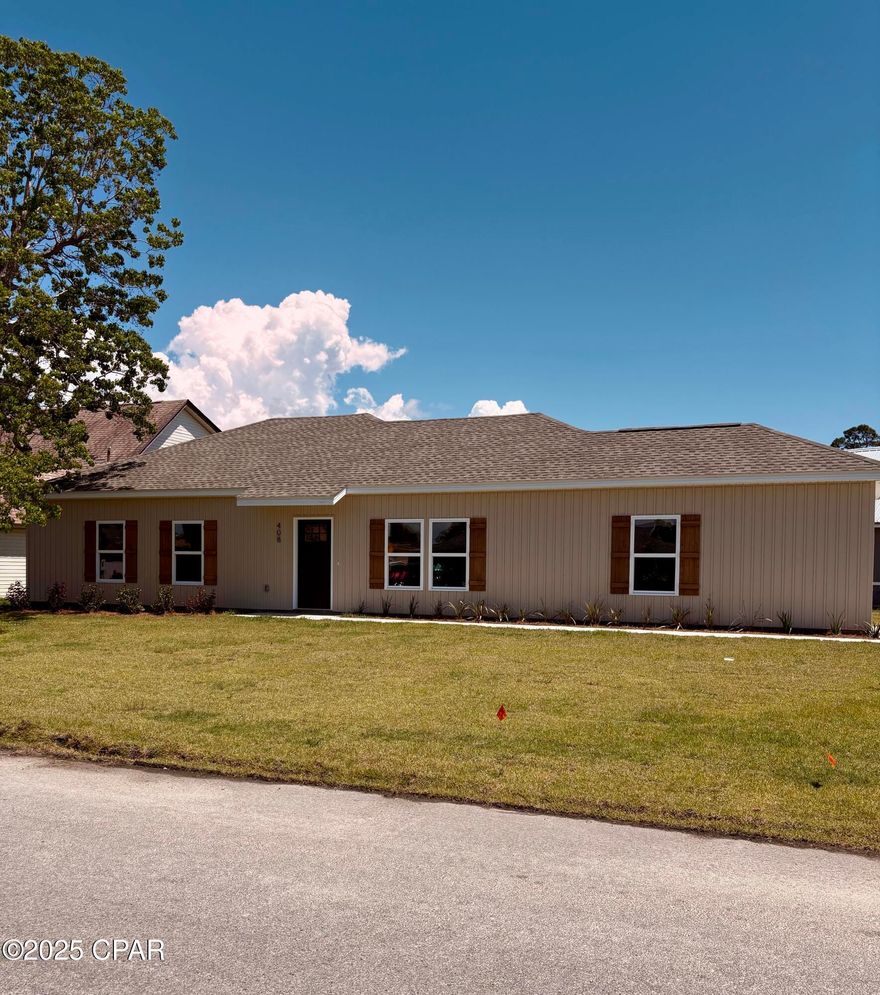 BEAUTIFUL NEW CONSTRUCTION CRAFTSMAN style home, conveniently located to TYNDALL. This spacious home is built in a traditional established neighborhood, NO COOKIE CUTTER HOMES HERE! The exterior offers a CHARMING BOARD AND BATTEN STYLE, a garage and sprinkler system. Once inside, you'll love the OPEN FLOOR PLAN with LVP FLOORING THROUGHOUT (no carpet here!), light and bright living area and nice laundry room. The kitchen features WHITE CABINETRY, GORGEOUS QUARTZ COUNTER TOPS and a HUGE ISLAND, perfect for entertaining! The private primary bedroom offers a walk in closet and a great bathroom with double vanities and an elegant tile shower. 2 guest rooms allow for everyone to have their own space. The fenced yard is perfect for out door activities and pets! NO FLOOD INS REQUIRED and NO HOA's.