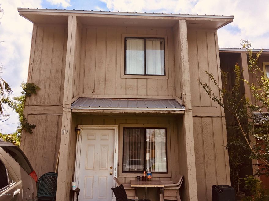 'CURRENTLY UNDER CONTRACT, SELLER ACCEPTING BACKUP OFFERS' -- MOTIVATED SELLER WANTS TO SEE ALL OFFERS. PERFECT HOME OR INVESTMENT OPPORTUNITY - GOOD LOCATION-EASY ACCESS- METAL ROOF - END UNIT - BACK YARD.  THE PROPERTY HAS GOOD ''GOOD BONES'' BUT NEEDS TLC. - SOLD AS IS -THE MATH WORKS ON THIS INVESTMENT OPPORTUNITY. PRICED TO SELL QUICKLY