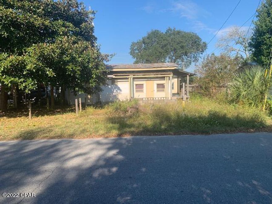 Great Opportunity to own property in the highly desirable Laguna Beach area, close to 30A and a short drive to Pier Park. Build your primary residence, 2nd home or vacation rental home here and you'll be only 3 blocks from the beach and close to Thomas Donuts and the Carousel Market. Currently there is a 1960s travel trailer on the lot, unable to access interior but please assume uninhabitable, this is a land sale.