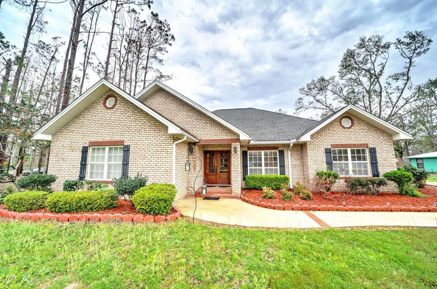 Absolutely stunning and immaculate 3(plus office)/3.5 home filled with all the high end upgrades you could think of! As you walk through the front double doors you will see the pristine beauty of the hardwood floors/ custom tile, 9ft ceilings throughout, 4 inch crown molding, and many many extras. Along with a custom, beautiful, heated and cooled florida room, you will have everything from your own Jacuzzi tub to your own shed with a carport in the backyard(along with a double car garage and huge driveway)! This home is truly set up to entertain with surround sound throughout every room and extra parking. The property features a deep water well, access to city water, and a septic. You even get to keep some of the beautiful furniture and extra appliances! Don't miss out on your dream home!