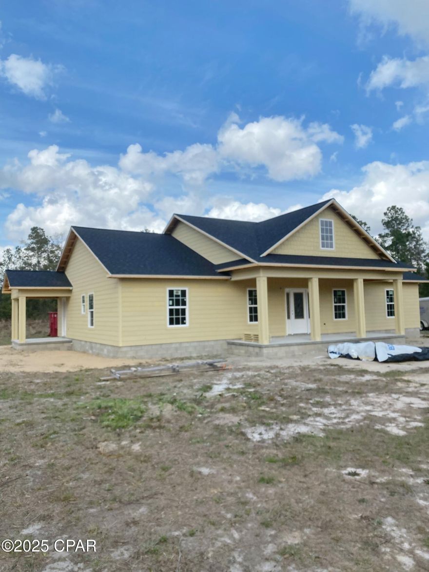 Your opportunity to own a HATCHER HOME in beautiful BLUE SPRINGS PLANTATION located just a short drive from downtown Marianna in a scenic area outside of town. This subdivision is highly sought after for the large lot sizes and private feel.  This home is being built on a 2.38+/- acre lot- plenty of room for your family and pets!  This home will have 2,016 square feet of living space under air with a split bedroom plan.  HATCHER HOMES is known for their modern touches to make their homes stand out and feel custom w/ vinyl plank flooring throughout, a 9 foot ceiling in the master suite and vaulted ceiling in the main living area.  This open concept living will have open sight lines in all of the common areas, plenty of kitchen cabinets, and spacious laundry room w/ side porch access for use as a mudroom making organization and storage a breeze.  The large front porch is ideal for enjoying this lovely setting!