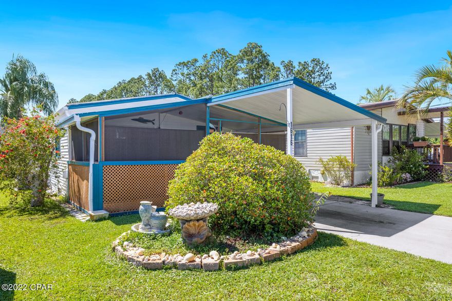 'CURRENTLY UNDER CONTRACT, SELLER WILL CONSIDER BACKUP OFFERS..PRICED TO SALE!!  New paint throughout home, New Refrigerator with icemaker, Beautiful glass tile backsplash and countertop. 2 Bedroom 2 Bath! No Short Term Rentals Allowed. Great home close to the Beach in a quiet neighborhood....55 & older retirement community includes community pool (Heated in winter months) and clubhouse, lawn care, secure fenced in area for boats and recreational vehicles available. Home has been well maintained.  Screened in porch ,Samsung Washer/dryer, convection oven, large master bedroom.  Plenty of extra storage. Metal roof 2 years old.  This home is a must see! ALL APPLIANCES INCLUDED IN SALE. NO FURNITURE INCLUDED. Home is being sold AS IS.