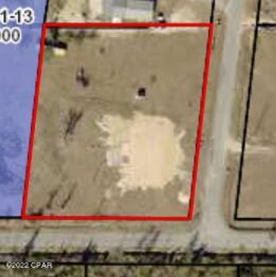 Flat, dry and a corner lot is the perfect place to build your home! This property features a new power pole, well with new pump and serviced septic. All in working order and ready for you to design and build your home! Flood zone X so no flood insurance required.