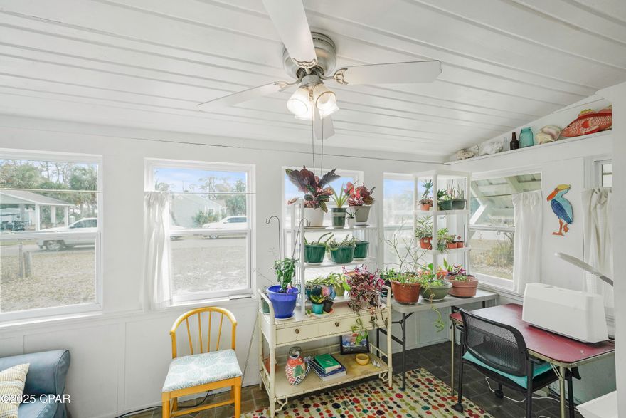 CURRENTLY UNDER CONTRACT, SELLER WILL CONSIDER BACKUP OFFERS. PRIME LOCATION IN PORT ST JOE!! This 2 bedroom, 2 bath coastal cottage sits on a double lot, making it the perfect retreat in the city limits of Port St. Joe. With authentic hardwood floors & solid tongue-and-groove walls & ceilings throughout, the home exudes timeless character. The cozy living area offers an inviting space to relax, & just beyond the French doors, the bright sunroom provides an outdoor-like atmosphere with its abundance of windows. A separate dining area is perfect for family meals, while the quaint kitchen offers plenty of storage & functionality. Both bedrooms are generously sized, with the primary suite featuring a private bath. The guest bedroom is conveniently located near the additional full bath, offering comfort and privacy for family or visitors. Step outside to the relaxing back porch, where you can enjoy the refreshing sea breeze & unwind after a day spent at the beach. With the extra lot, there is ample space to park your boat, RV, or even build a separate structure. No HOA dues or restrictions beyond county regulations, & no flood insurance is required in the X Flood Zone. Explore scenic bike trails, take leisure golf cart rides, visit the local farmers market for fresh produce and artisan goods, enjoy live music and amazing fresh seafood. In the evening, enjoy beautiful sunsets on the St. Joseph Bay. This vibrant community invites you to embrace the beauty and simplicity of coastal living and a slower pace, just minutes to local, pristine beaches, where you can enjoy shelling, fishing, and strolling the beaches for miles. Be sure to check out the 3D video and call for your private showing today!!