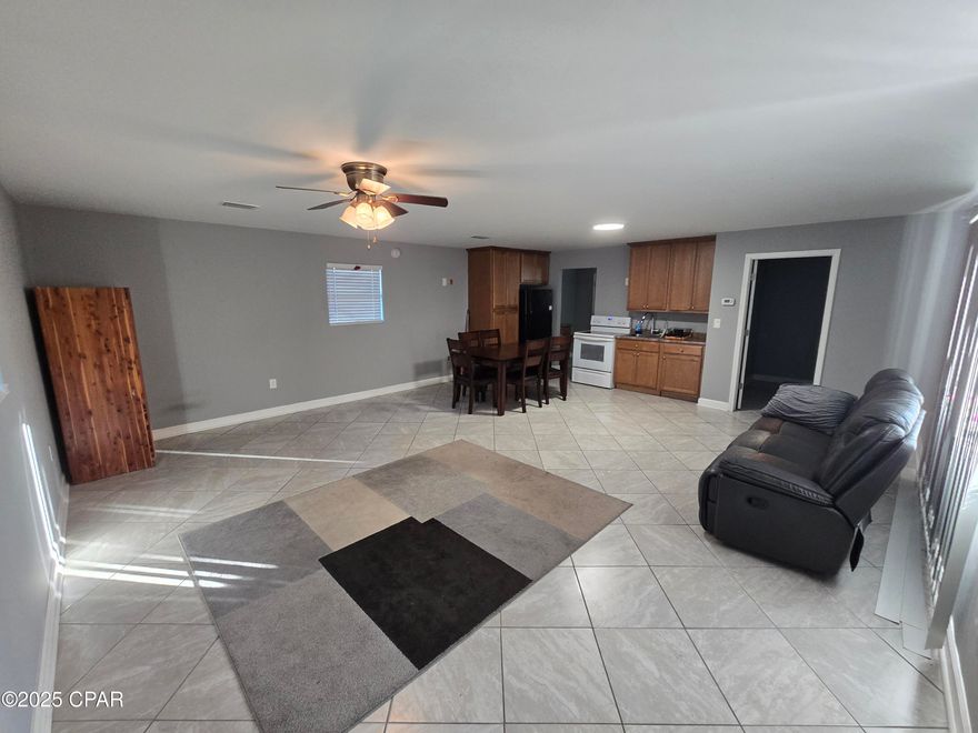 If you are in the market for an affordable, sturdy, updated, low maintenance , cozy home to live in while you build your dream home on the property. Then this is the one for you!! Renovated and updated in 2019 including roof. With the Hardie board exterior and tile flooring throughout makes it not only move in ready but very little to keep up. This is a large lot that is almost 1/4 of an acre so there is plenty of room to build in front where the previous home was at one time.   It is just a short stroll to the bay for your evening walk then head over to Gene's Oyster Bar for dinner on the next block!!!