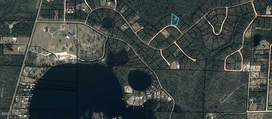A partially-cleared, gently-sloping building lot is located less than 3/4 of a mile away from the community club house. It is high and dry and features a developed garden. It also has walking trails that open up into the land so you are able to see what you have. The flood map shows that it is not located in a flood zone. Compass Lake in the Hills is a deed restricted subdivision located off of Highway 231 in Jackson County. Featuring disk golf, a driving range, swimming pool, camping, waterfront restaurants, and multiple freshwater lakes, with the best one being Compass Lake. Compass Lake is a gorgeous spring-fed lake that is loved for boating, fishing, and water-skiing. This lot is just around the corner! On McCormick Lake there are two beach areas with water toys, a clubhouse, and two covered pavilions available for rent. McCormick Lake is an exclusive facility only available to members and their guests. There are fishing boats, fun yaks, and a beautiful beach on a serene lake. No gasoline engines are allowed on that lake, but boats with electric motors are. The HOA dues are voluntary $135/year, but required to utilize the amenities. Enjoy the slower pace of life this community offers while being less than an hour from Panama City Beach! Buyer to pay owner's title policy and associated title fees.