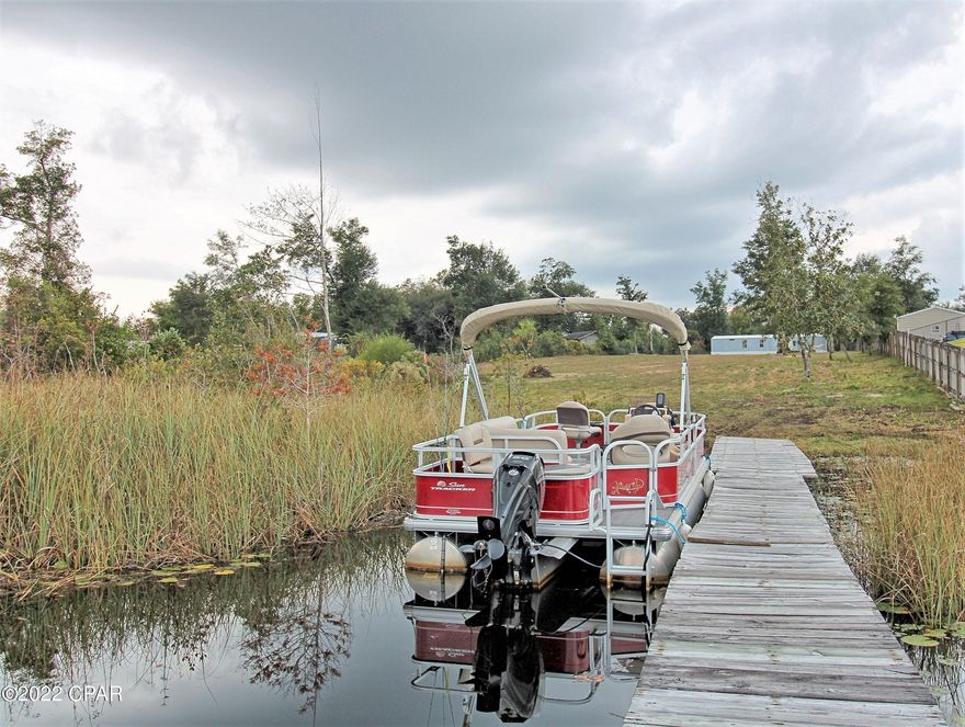 'CURRENTLY UNDER CONTRACT, SELLER WILL CONSIDER BACKUP OFFERS' 

Bring your boat, jet ski, fishing poles, and kayaks! If you love the outdoors,

 then this home on the coveted Cedar Creek is for you! Cedar Creek runs into 5,000 acres of spring fed water on Deerpoint Lake and offers a multitude of fishing, kayaking, boating, duck hunting, and much more. There are so many options for this parcel. Live in this recently updated 3-bedroom 2 bath mobile home 

while building your dream home. This home has recently been updated to include LVP flooring, all new bathrooms, new kitchen, new AC with Furnace, and a new deep well. Public water is available but save hundreds a year with your own water supply. MOTIVATED SELLER! BRING ALL OFFERS.