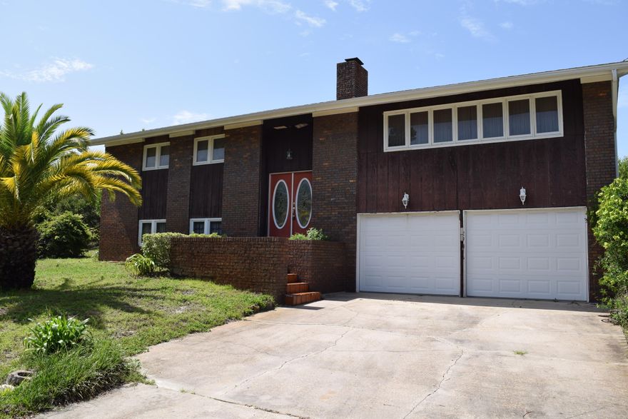 This property has the two most important things--good location and good bones! The Lullwater neighborhood is between Pier Park and Highway 79. Also, down the street from the beach and Frank Brown Park! And just a short drive to Rosemary Beach! This 2 story house is 2552 sq ft and has 4 bedrooms and 3 bathrooms. The large deck offers outdoor space for grilling and the over sized lot also has a storage building. The living room has vaulted ceilings and a fireplace. This could be your next permanent home or vacation home! Everything you need is either walking distance or a short drive.