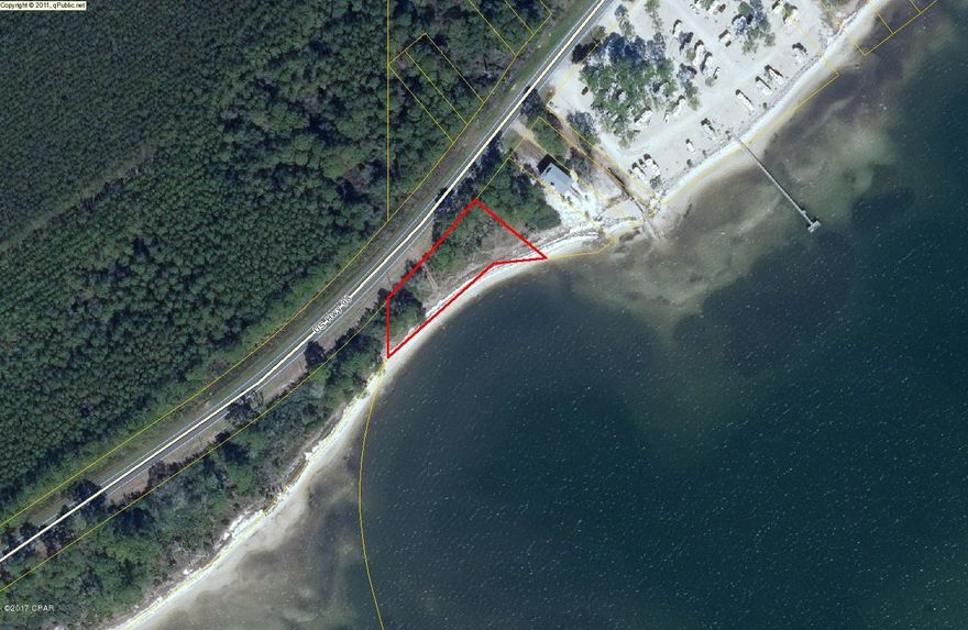 This property is zoned C4 Mixed Use/Commercial in Franklin County. Located on Apalachicola Bay East of Carrabelle, FL, the subject property had a DEP approved marina permit for a 22 slip marina in place. Water and Sewer are within 300' of the site. This is a rare marina opportunity on beautiful Apalachicola Bay. Allowable uses for the uplands include but are not limited to hotel/motel, retail, warehouse/storage, and R1/R2 residential uses. IF MEASUREMENTS ARE IMPORTANT PLEASE VERIFY.