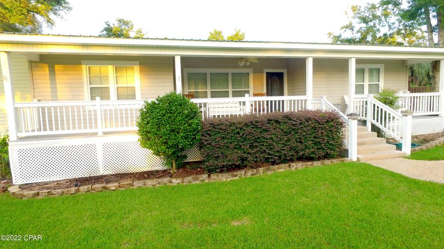 One of those rare finds has surfaced!  A well-established, pristinely maintained 4 bed 3.5 bath estate nestled in the heart of Marianna is up for grabs.  Situated on 0.8 landscaped acres, this beautiful home boasts over 2500sq ft of indoor living space, a 2 car carport and a 24x48x16 pole barn.  The privacy fence sections off a lush green area for outdoor entertaining, a children's play area, or a fur baby's paradise.  The charming neighborhood was established in the 1950s and has undergone a steady revitalization over the past few of years.  This home really is the total package of space, comfort, charm, and location.  Don't miss out.  Book your tour today and lock it in!