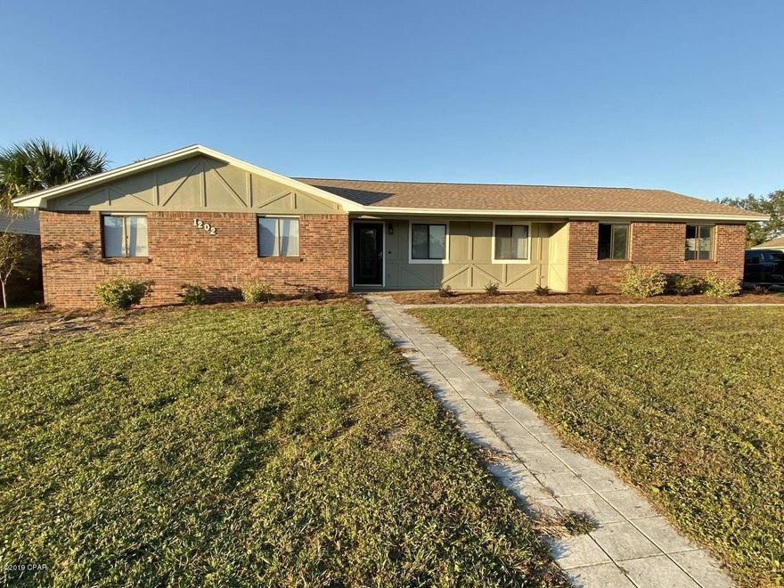 Spacious brick home in quiet Venetian Villa with 4 bedrooms, 2 baths.  Roof recently replaced along with fresh paint throughout and new LVP flooring and tile. No carpet makes for easy maintenance.  This large corner lot is conveniently located between Panama City Beach and Lynn Haven.  Excellent schools nearby.  Short distance to Gulf Coast State College.  Large 2 car garage and separate spacious workshop.  Plenty of outdoor space to relax with a screened porch and also a covered back porch.  Private fenced in back yard with lots of space to park your boat or RV.  Detached shed.  Pets are negotiable with additional deposit. One year lease required.