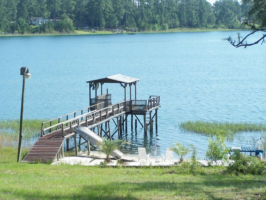 WATERFRONT HOME ON SILVER LAKE! Priced below appraised value. Very motivated Seller, must relocate. Ready to move into! Beautiful, crystal clear, Silver Lake, no outboard motors, great for canoeing, kayaking, sailing or just swimming. Great Dock to jump from, man made beach, all one of a Kind. Lot measurements are approximate but about 130 front foot on the lake. 3 or 4 Br home that haws had a lot of customizing on the interior with smooth river rock decorating, ceramic tile flooring, archways, picture windows looking out over the water, large screen porch, 2 outbuildings. The home has metal roof, 2 C/E heat/cooling units, double pane windows, stainless steel appliances and many other upgrades through out the home and property.