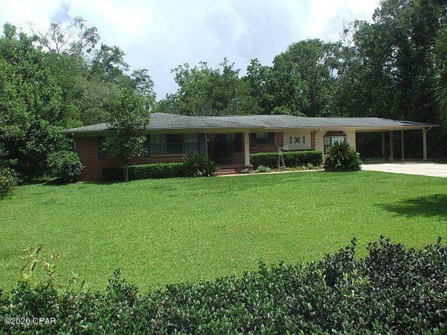 CURRENTLY UNDER CONTRACT SELLER ACCEPTING BACK UP OFFERS Nice 4 bedroom, 2 bath in the edge of town, yet quiet and peaceful!!! This home features a nice open kitchen with new appliances! Fridge & Dishwasher are Stainless Steel.  The kitchen also features plenty of counter and cabinet space AND a large island to give you extra space for food prep, storage, or extra dining space. Large breakfast area and den adjoining the kitchen The separate dining room is just through a swinging door from the kitchen to provide convenience when serving, and opens into a cozy and peaceful living room. Down the hall the first bedroom is spacious with a large cased opening to a sitting/study area.  A full bath is also located in the hallway. 2 additional bedrooms and the Master Bedroom and bath are on the west end of the home. Outside you will notice a nice front porch on the front of the home, a large double carport on the east end of the home, a very spacious 12 x 28 back deck with built-in seating, and a 10x14 storage building/workshop located in the large back yard.  Call to see this one, you don't want to miss all this!!!!!