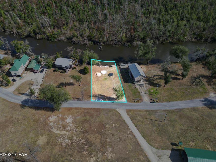 Come enjoy the peace and tranquility the Chipola River offers.  This river is perfect for those who enjoy the outdoors!  This lot and a half has underground utilities, septic and well.  It's ready for you to build your dream home.  The area is prime for Airbnb, vacation home or if you are lucky enough to live there year round.